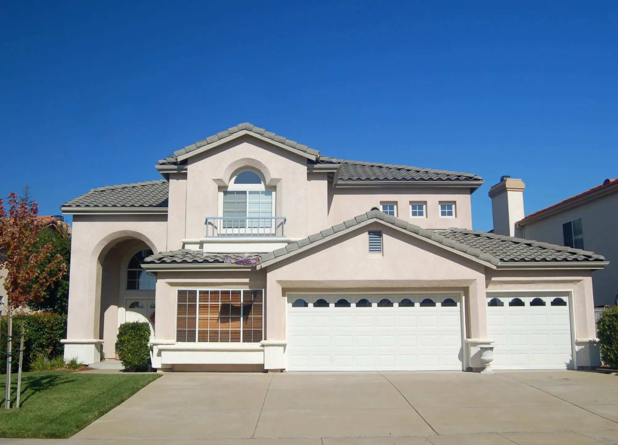 Fire damage rebuild and restoration project in Los Angeles showing fully restored home exterior with new finishes