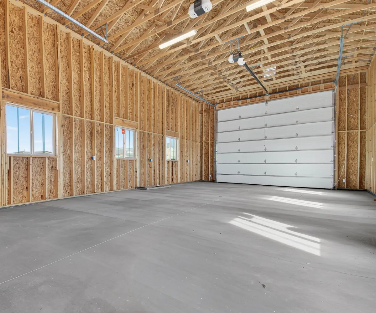Garage conversion ADU in Los Angeles with exposed wood framing and interior structure ready for finishing