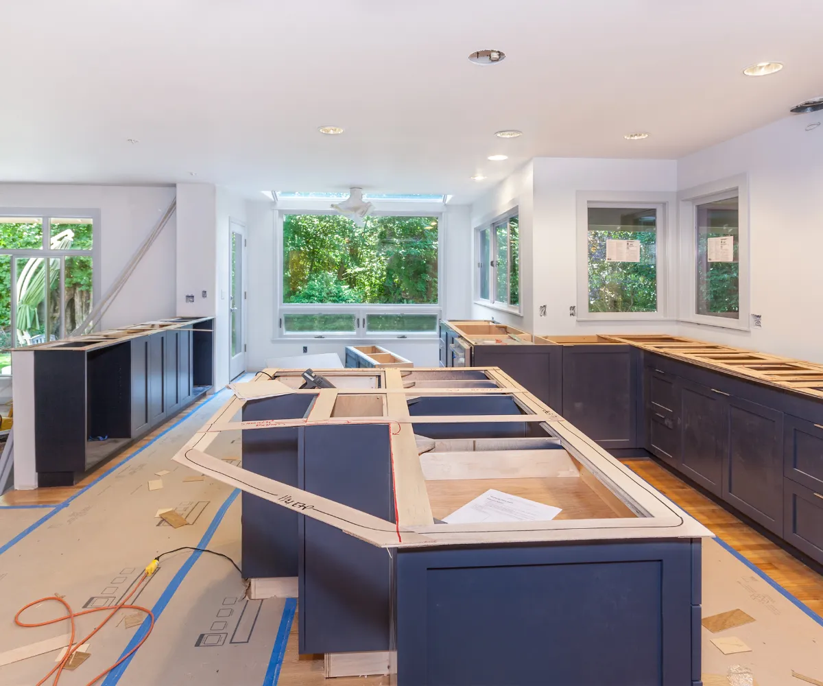 Kitchen remodeling Los Angeles with modern cabinet installation, open layout design, and ongoing renovation work