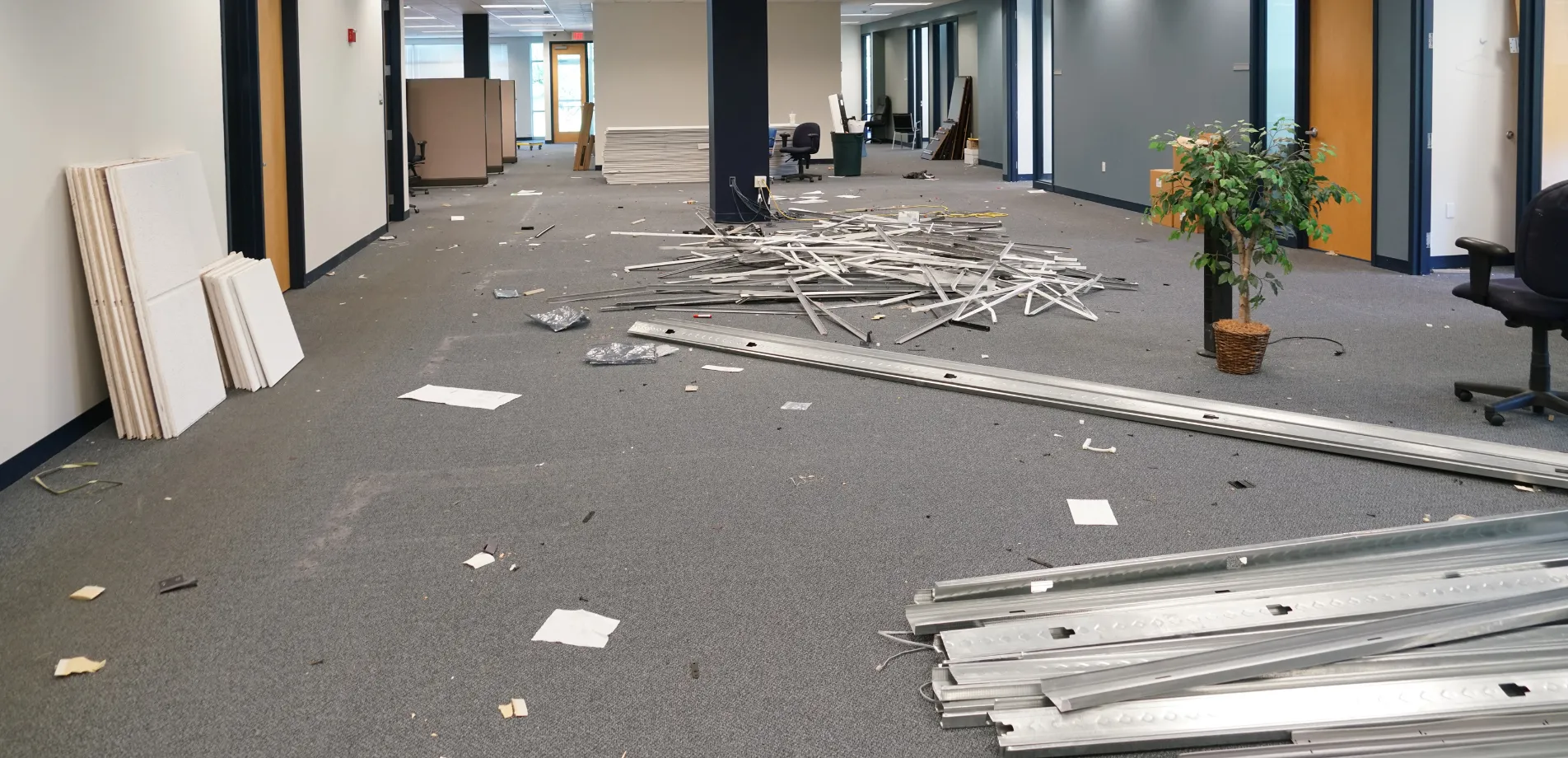 Commercial office remodeling demolition in Los Angeles with removed framing, debris, and open workspace ready for renovation