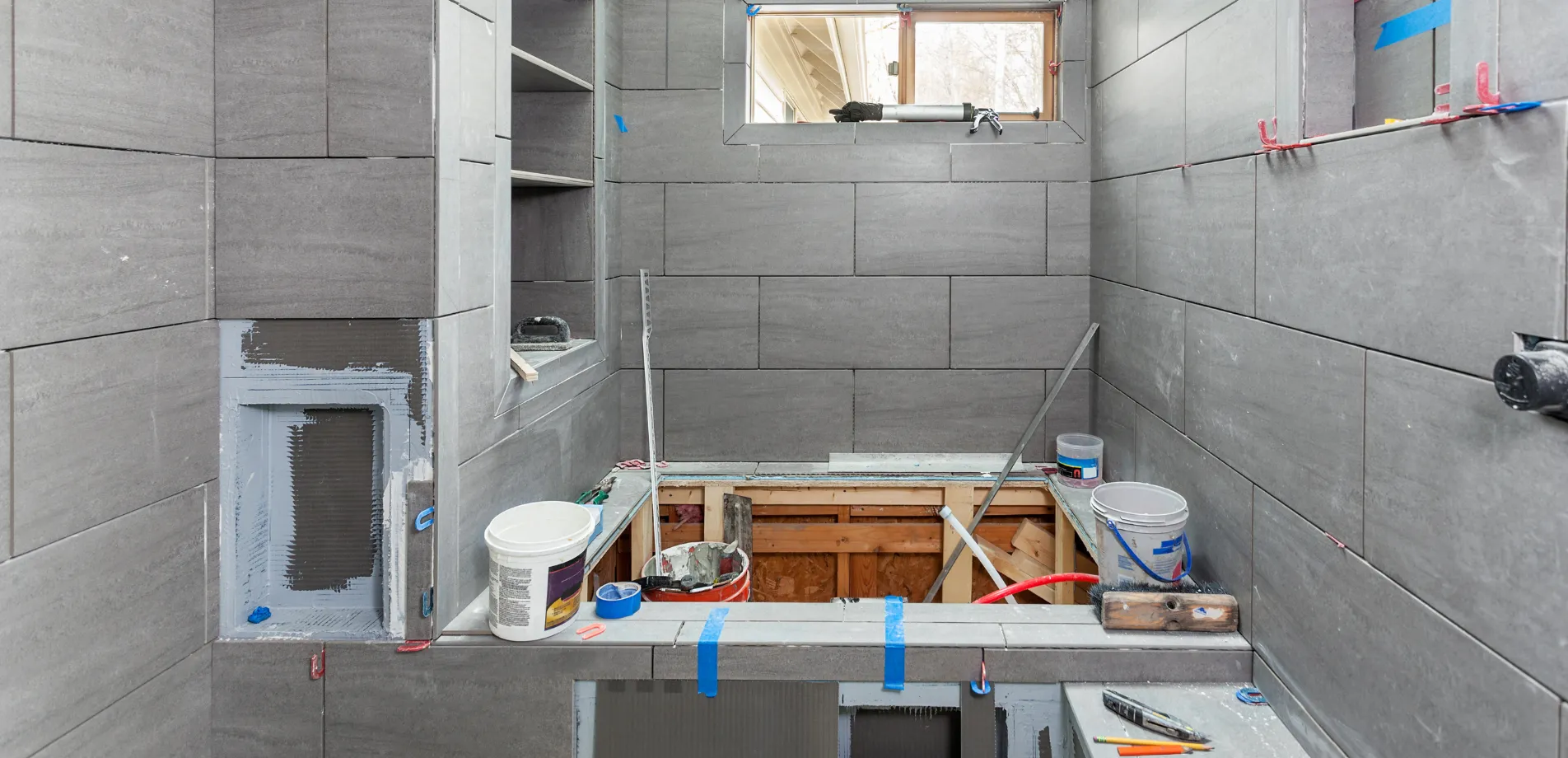Bathroom remodeling in Los Angeles featuring custom tile installation and shower build in progress