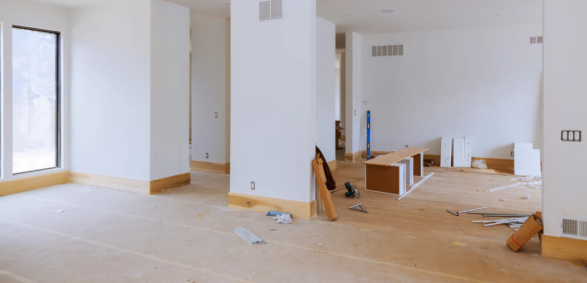 Home remodeling project in Los Angeles showing open interior space during renovation with flooring and wall upgrades in progress